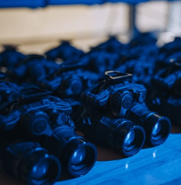 Licentia Arms Image Credit Night Vision Binoculars On A Table